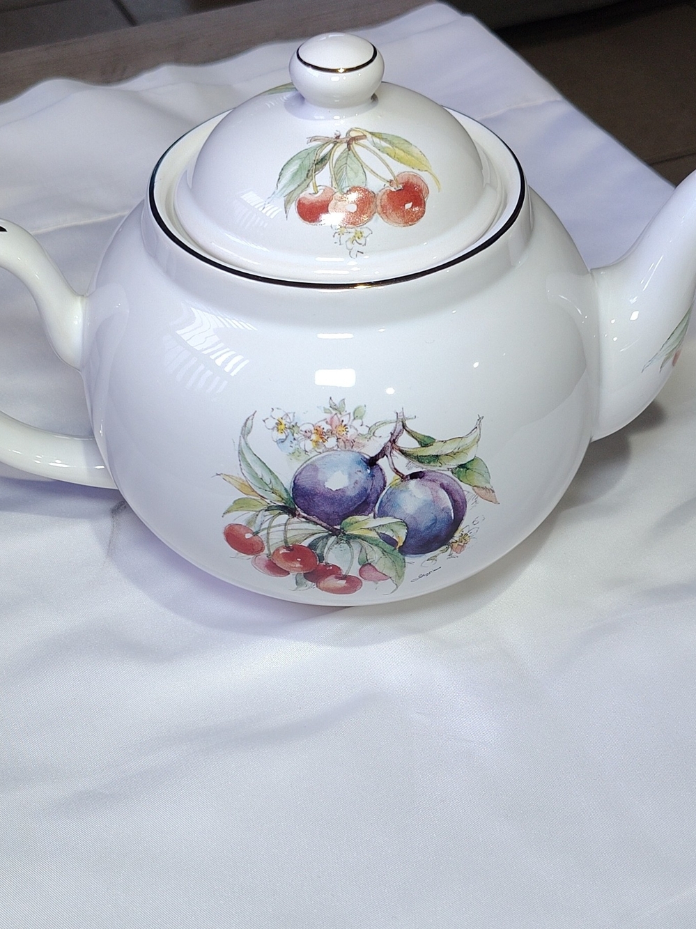 White Ceramic Teapot with Fruit Motif and Gold Trim